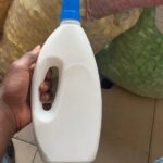 Image of a white, 1-liter plastic container with a secure lid. The simple, clean design highlights the product's versatility and durability.