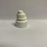 Image of a small, translucent 10ml eye drop bottle with a fine dispensing tip and a secure white or clear cap, on a clean surface.