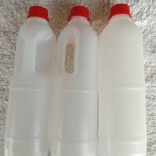 Small white gallon container with a red lid, ideal for food, cosmetics, or industrial use, supplied by Eloquent Print & Packaging.
