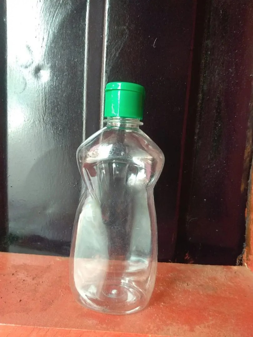 Clear 250ml PET cosmetic bottle from Eloquent Prints & Packaging, showcasing a sleek, transparent design for skincare and haircare products.