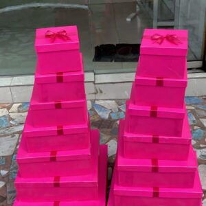 Bright pink gift boxes with lids, perfect for stylish gift packaging for birthdays, weddings, baby showers, and special celebrations.