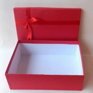Red Gift Box With a Lid And a Decorative Ribbon