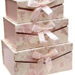 Stackable decorative storage boxes for organizing home or office items, combining stylish design with practical, space-saving storage solutions.