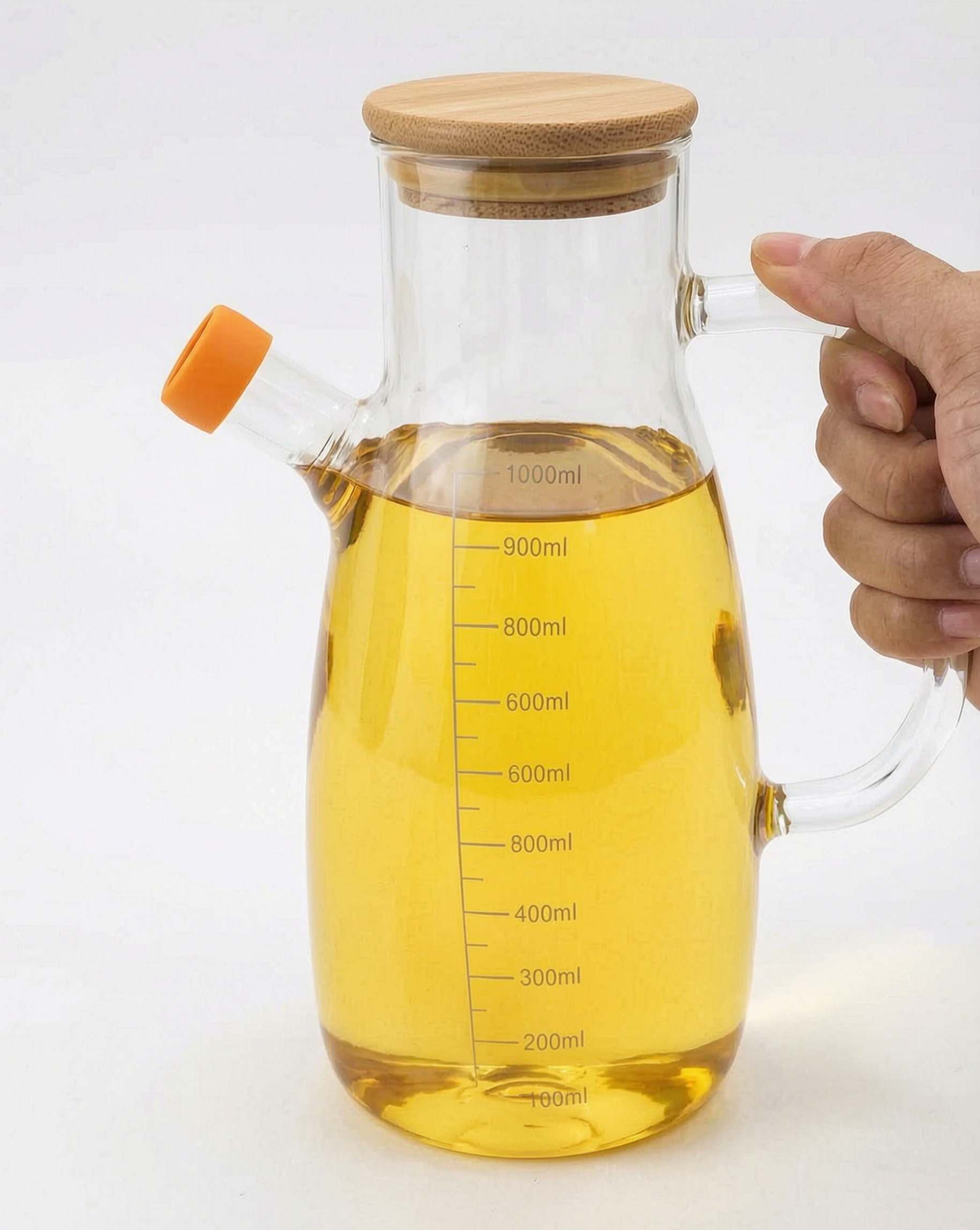 1000ml Borosilicate Glass Oil Jars Dispenser for cooking oil storage and dispensing, supplied by Eloquent Prints and Packaging in Lagos Nigeria.