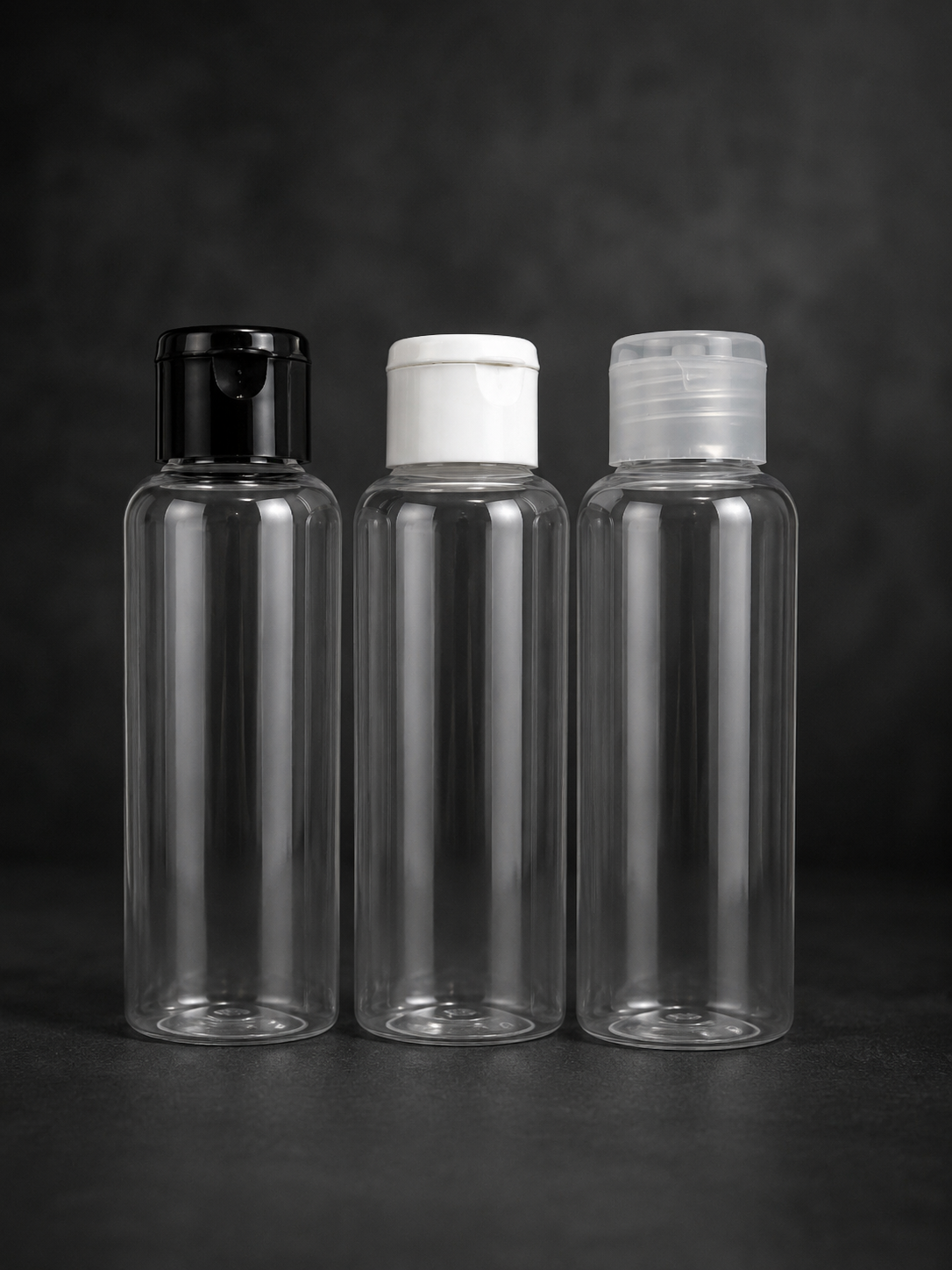 100ml transparent plastic flip cap oil bottle for packaging hair oil, skincare products, cosmetics, and liquid products in Lagos, Nigeria.