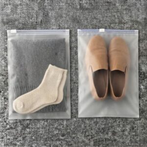 Frosted translucent reusable zip lock bags for clothes, garments, shoes, travel storage, and packaging.
