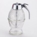 Honey Dispenser Pot for convenient honey serving and food presentation in homes, restaurants, cafés, and hotels.