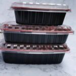1000ml disposable plates with transparent lids for takeaway food packaging supplied by Eloquent Prints and Packaging in Lagos, Nigeria.